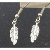 Feather pierced earrings, small feathers - Kpughdesigns